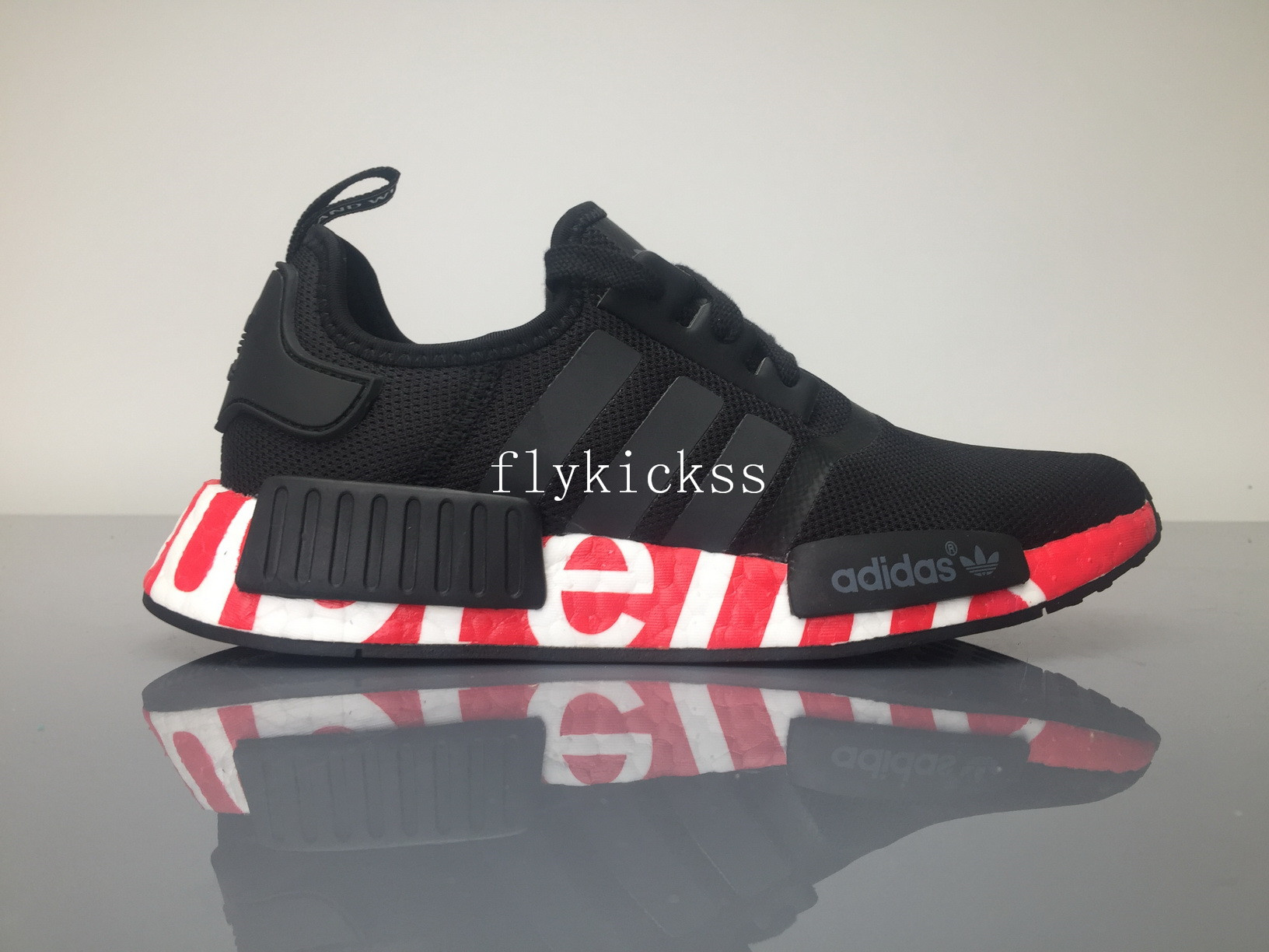 Supreme x Adidas NMD R1 Black Real Boost